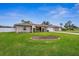 Single-story house with well-maintained lawn at 1236 Pinebrook Way, Venice, FL 34285
