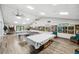 Spacious game room with ping pong and pool tables at 1236 Pinebrook Way, Venice, FL 34285