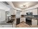 Updated kitchen featuring granite countertops and modern cabinetry at 1236 Pinebrook Way, Venice, FL 34285