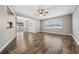 Bright living room with hardwood floors and an open floor plan at 1236 Pinebrook Way, Venice, FL 34285