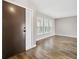 Bright living room with hardwood floors and shutters at 1236 Pinebrook Way, Venice, FL 34285