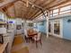 Covered outdoor kitchen and dining area at 1300 Indus Rd, Venice, FL 34293