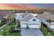 Luxury home with lake view in a gated community at 13072 Steinhatchee Loop, Venice, FL 34293