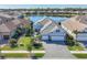 Luxury home with lake views and 3-car garage; desirable community at 13072 Steinhatchee Loop, Venice, FL 34293