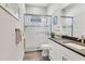Clean bathroom with a walk-in shower, and modern vanity at 13072 Steinhatchee Loop, Venice, FL 34293