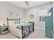 Guest bedroom with a king-size bed and coastal decor at 13072 Steinhatchee Loop, Venice, FL 34293
