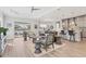 Open concept living space with kitchen and pool access at 13072 Steinhatchee Loop, Venice, FL 34293