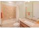 Bathroom with tub, shower, and granite vanity at 13164 Rinella St, Venice, FL 34293