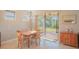 Casual dining area with sliding glass doors leading to backyard at 13164 Rinella St, Venice, FL 34293