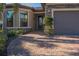 Welcoming front entrance with paver driveway and nicely landscaped at 13164 Rinella St, Venice, FL 34293