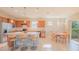 Modern kitchen with granite countertops and stainless steel appliances at 13164 Rinella St, Venice, FL 34293