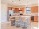 Modern kitchen with granite countertops and stainless steel appliances at 13164 Rinella St, Venice, FL 34293