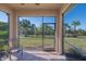 Relaxing screened porch overlooking backyard at 13164 Rinella St, Venice, FL 34293