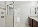 Clean bathroom with shower stall and granite-topped vanity at 13421 Gershwin Ln, Port Charlotte, FL 33981