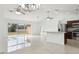 Kitchen with dark wood cabinets and granite island at 13421 Gershwin Ln, Port Charlotte, FL 33981