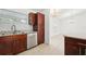 Kitchen with granite countertops, stainless steel appliances, and wood cabinets at 13421 Gershwin Ln, Port Charlotte, FL 33981