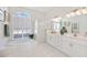 Bathroom with double vanity and walk-in shower at 1348 Reserve Dr, Venice, FL 34285