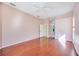 Light and airy bedroom with wood floors at 1348 Reserve Dr, Venice, FL 34285