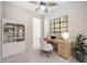 Bright home office features built-in shelving and a spacious desk area at 1348 Reserve Dr, Venice, FL 34285