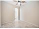 Empty home office with tile flooring and access to another room at 1348 Reserve Dr, Venice, FL 34285