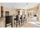 Kitchen with breakfast bar and view into the backyard at 1348 Reserve Dr, Venice, FL 34285