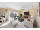 Bright living room with fireplace and pool view at 1348 Reserve Dr, Venice, FL 34285