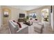 Bright living room with access to the pool and patio at 1348 Reserve Dr, Venice, FL 34285