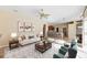 Open living room, kitchen, and dining area at 1348 Reserve Dr, Venice, FL 34285
