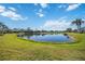Peaceful pond view from the backyard at 1348 Reserve Dr, Venice, FL 34285