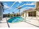 Inviting screened pool with dolphin mosaic at 1348 Reserve Dr, Venice, FL 34285