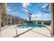 Relaxing screened pool and spa area at 1348 Reserve Dr, Venice, FL 34285