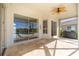 Covered patio overlooking the pool and golf course at 1348 Reserve Dr, Venice, FL 34285