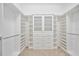 Large walk-in closet with ample shelving at 1348 Reserve Dr, Venice, FL 34285