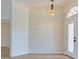 Light and airy entryway with neutral walls and wood floors at 1558 Belfry Dr, Venice, FL 34292