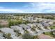 Community overview showcasing numerous villas and lush greenery at 1647 Lancashire Dr # 1647, Venice, FL 34293