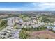 Wide shot of the community with lake and golf course views at 1647 Lancashire Dr # 1647, Venice, FL 34293