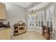 Charming breakfast nook with built-in wine rack and window seat at 1647 Lancashire Dr # 1647, Venice, FL 34293