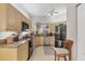 Kitchen with granite countertops and stainless steel appliances at 1647 Lancashire Dr # 1647, Venice, FL 34293