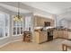 Kitchen with granite countertops, built-in wine rack and updated appliances at 1647 Lancashire Dr # 1647, Venice, FL 34293