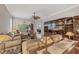 Spacious living room with built-in shelving and comfortable seating at 1647 Lancashire Dr # 1647, Venice, FL 34293