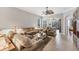 Living room with tiled floors and neutral color palette at 1647 Lancashire Dr # 1647, Venice, FL 34293