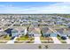 Aerial view showcasing the property's location in a residential community at 16766 Carlton Pond St, Wimauma, FL 33598