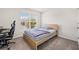 Cozy bedroom with a double bed and workspace at 16766 Carlton Pond St, Wimauma, FL 33598