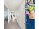 Bright and spacious entryway with tile flooring, leading to living areas at 16766 Carlton Pond St, Wimauma, FL 33598
