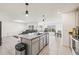 Open concept kitchen island with granite countertops at 16766 Carlton Pond St, Wimauma, FL 33598