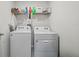 Convenient laundry room with washer and dryer at 16766 Carlton Pond St, Wimauma, FL 33598