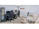 Home office featuring a comfortable sofa and gaming setup at 16766 Carlton Pond St, Wimauma, FL 33598