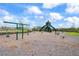 playground with swings and climbing structure at 16766 Carlton Pond St, Wimauma, FL 33598