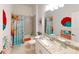 Bathroom with tub shower combo and granite countertop at 2009 Mackerel St, Port Charlotte, FL 33953
