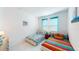 Bedroom with two twin beds and shared bathroom at 2009 Mackerel St, Port Charlotte, FL 33953